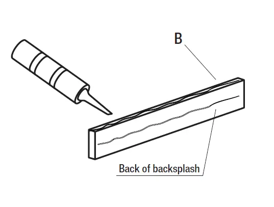 Nakładanie uszczelniacza na backsplash