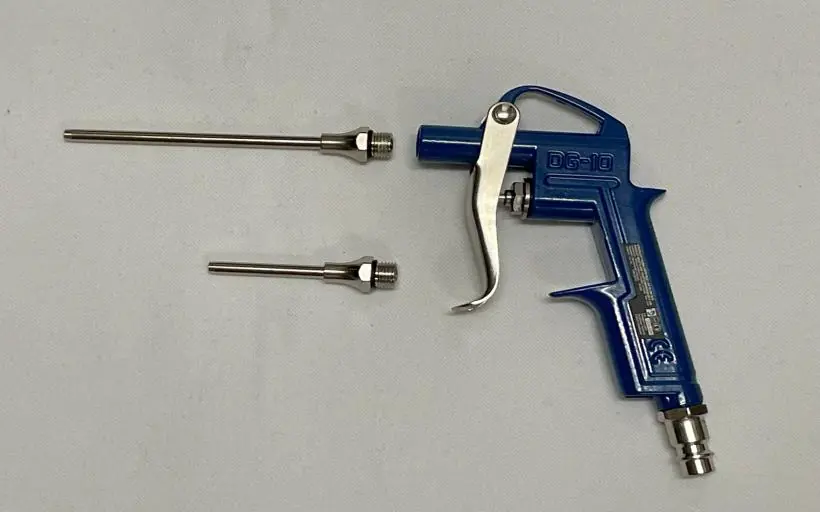 Pistolet do przedmuchiwania i srebrne przedłużki
